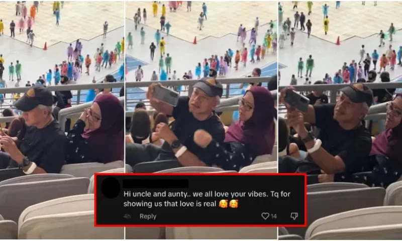 Elderly couple takes selfie at Coldplay concert