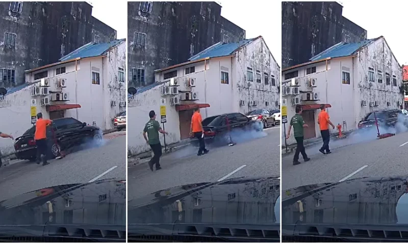 Upset Car Owner Speeds Away After Workshop Attempts to Remove His Tire Due to Payment Issues