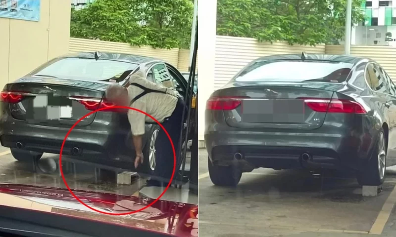 Singaporean Man Spotted Placing a Brick Beneath His Jaguar to Increase Fuel Pumping in JB